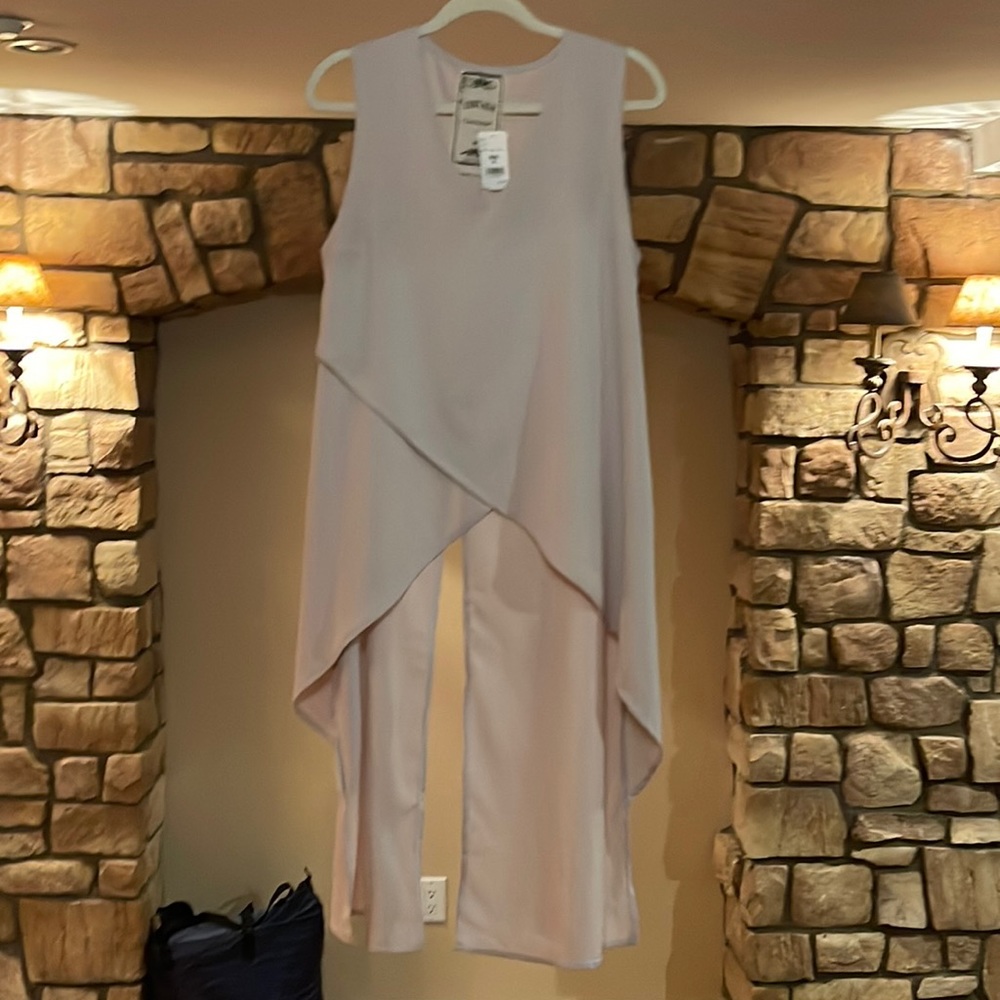 NWT. Nude color dress. Woman’s size M. Brand is Ember.